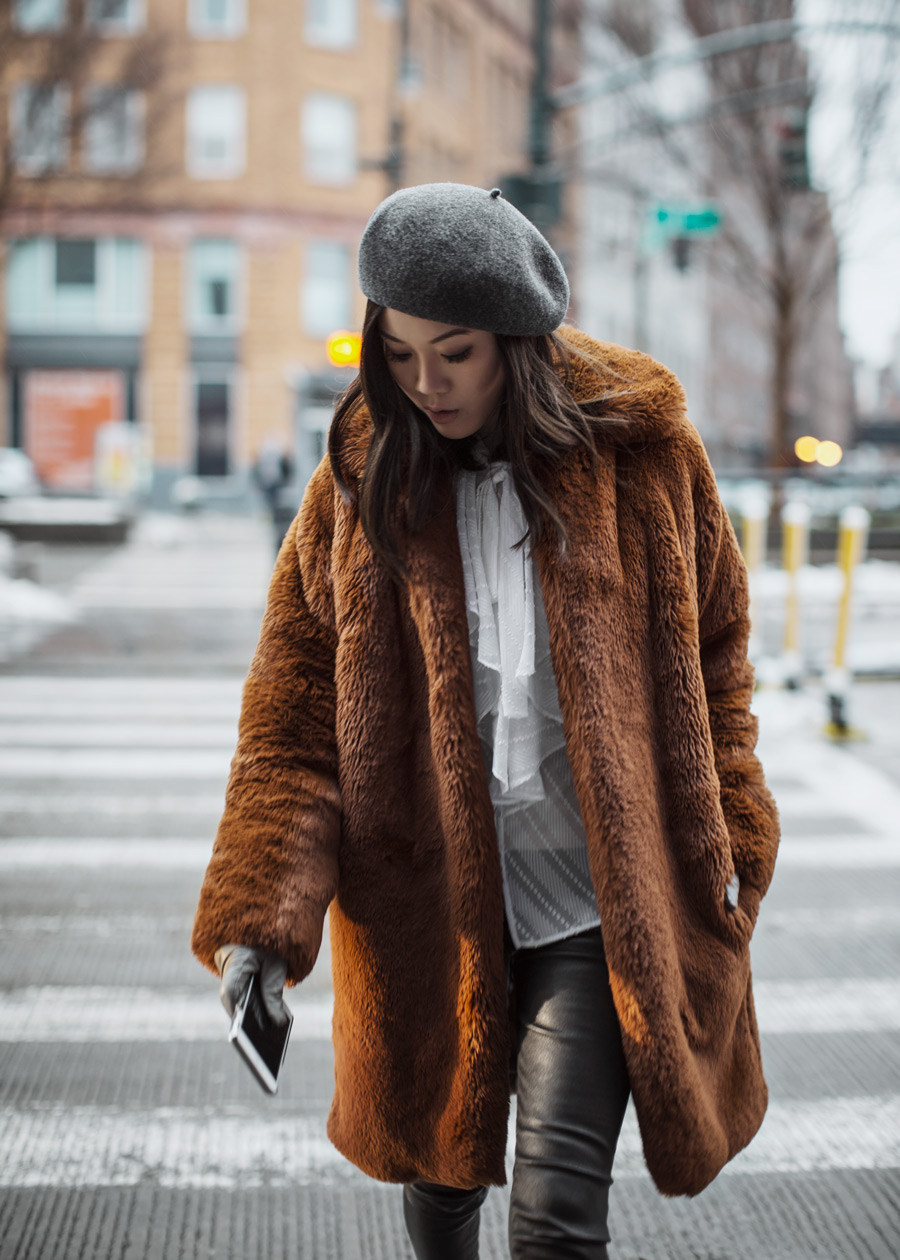 Street style fashion blogger influencer Jenny Tsang of Tsangtastic wearing KAREN MILLEN Teddy Fur Coat, KAREN MILLEN Ruffle Shirt, VINCE Leather Pant, Grey Wool Beret and PERLA FORMENTINI Mia Patchwork Pointy Ankle Boot during New York Fashion Week.