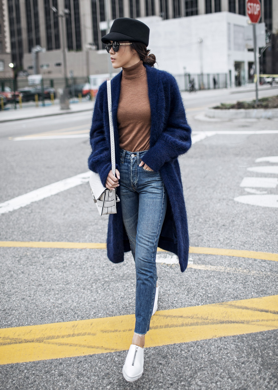 Street style fashion blogger influencer Jenny Tsang of Tsangtastic wearing BYTSANG Fuzzy Cardigan Coat in Navy, VINCE sneakers, PAIGE Straight Jeans, in Los Angeles, California.