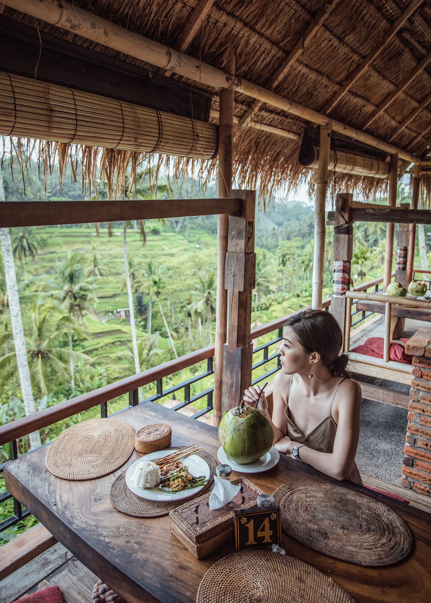 Fashion and travel blogger influencer Jenny Tsang of Tsangtastic traveling in Bali, Indonesia, wearing VINCE Satin Slip Dress Swim, at Rice Terrace.