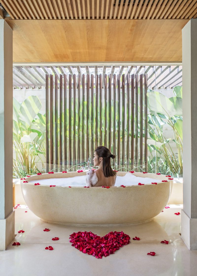Fashion and travel blogger influencer Jenny Tsang of Tsangtastic traveling in Bali, Indonesia, staying at The Bale, Nusa Dua Bali, enjoying bubble bath.