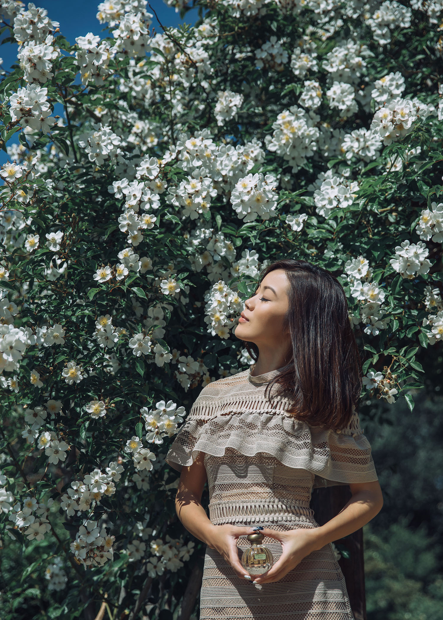 Street style fashion blogger influencer Jenny Tsang of Tsangtastic wearing SELF PORTRAIT Midi Dress, TOCCA Florence Fragrance and ROGER VIVIER Espadrilles, in Los Angeles, California.