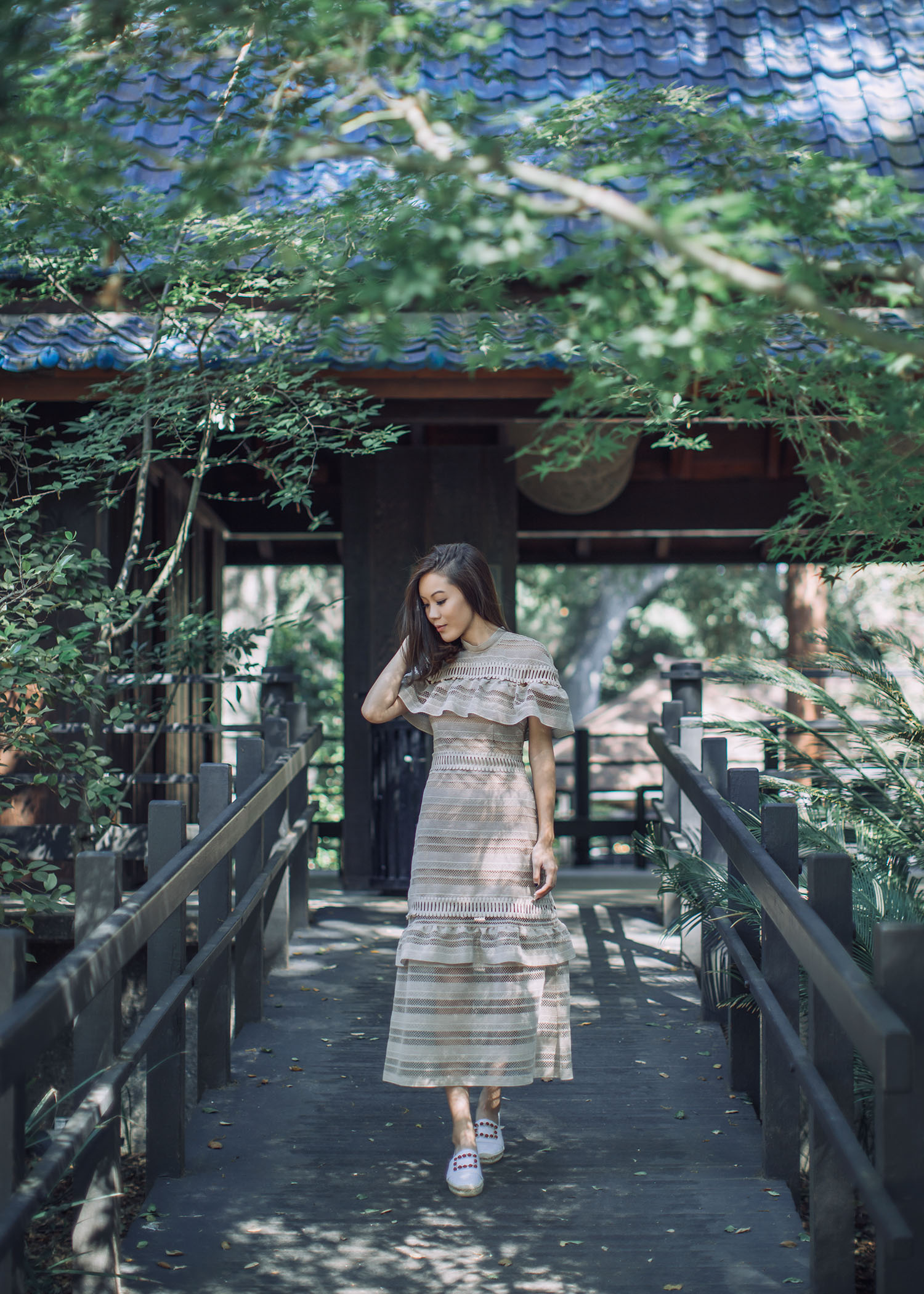 Street style fashion blogger influencer Jenny Tsang of Tsangtastic wearing SELF PORTRAIT Midi Dress, TOCCA Florence Fragrance and ROGER VIVIER Espadrilles, in Los Angeles, California.