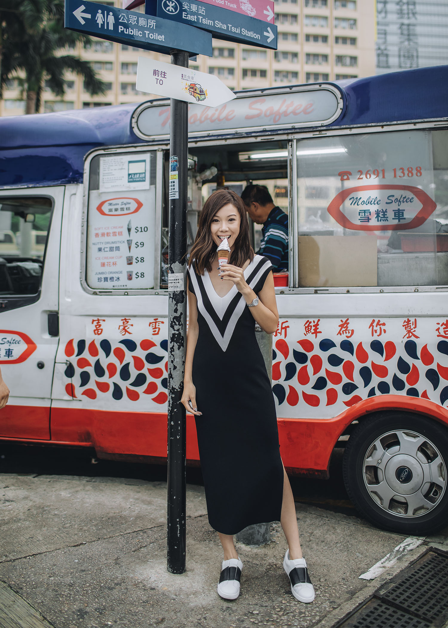 Street style fashion blogger influencer Jenny Tsang of Tsangtastic wearing RAG & BONE Daphne Varsity Sweater Dress and VINCE Sneaker with black bend, in Hong Kong.