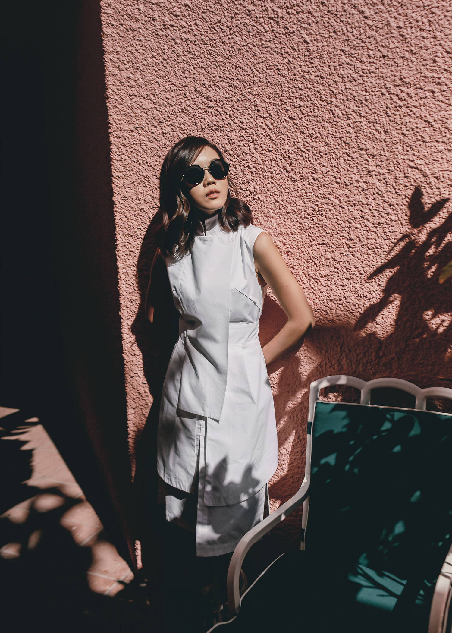 Street style fashion blogger influencer Jenny Tsang of Tsangtastic wearing ACLER Shirt Dress, GUCCI Round Sunglasses, ELLERY zipped platform ankle boots, in Beverly Hills Hotel, Los Angeles, California.