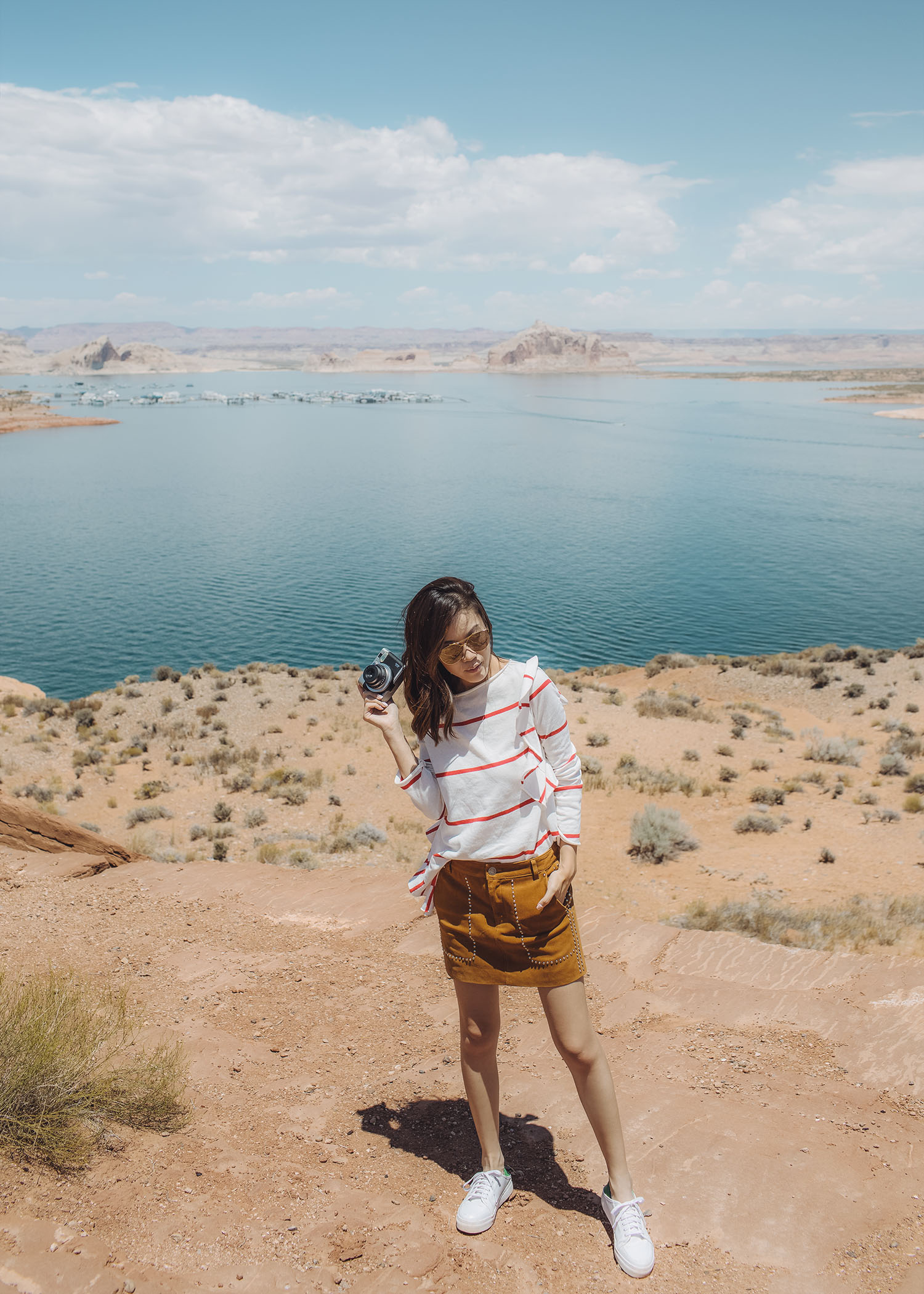Arizona must visit top 5 Antelope Canyon Must visit Lifestyle fashion travel blogger Jenny Tsang of Tsangtastic wearing white dress and white sneakers in Antelope Canyon in Arizona