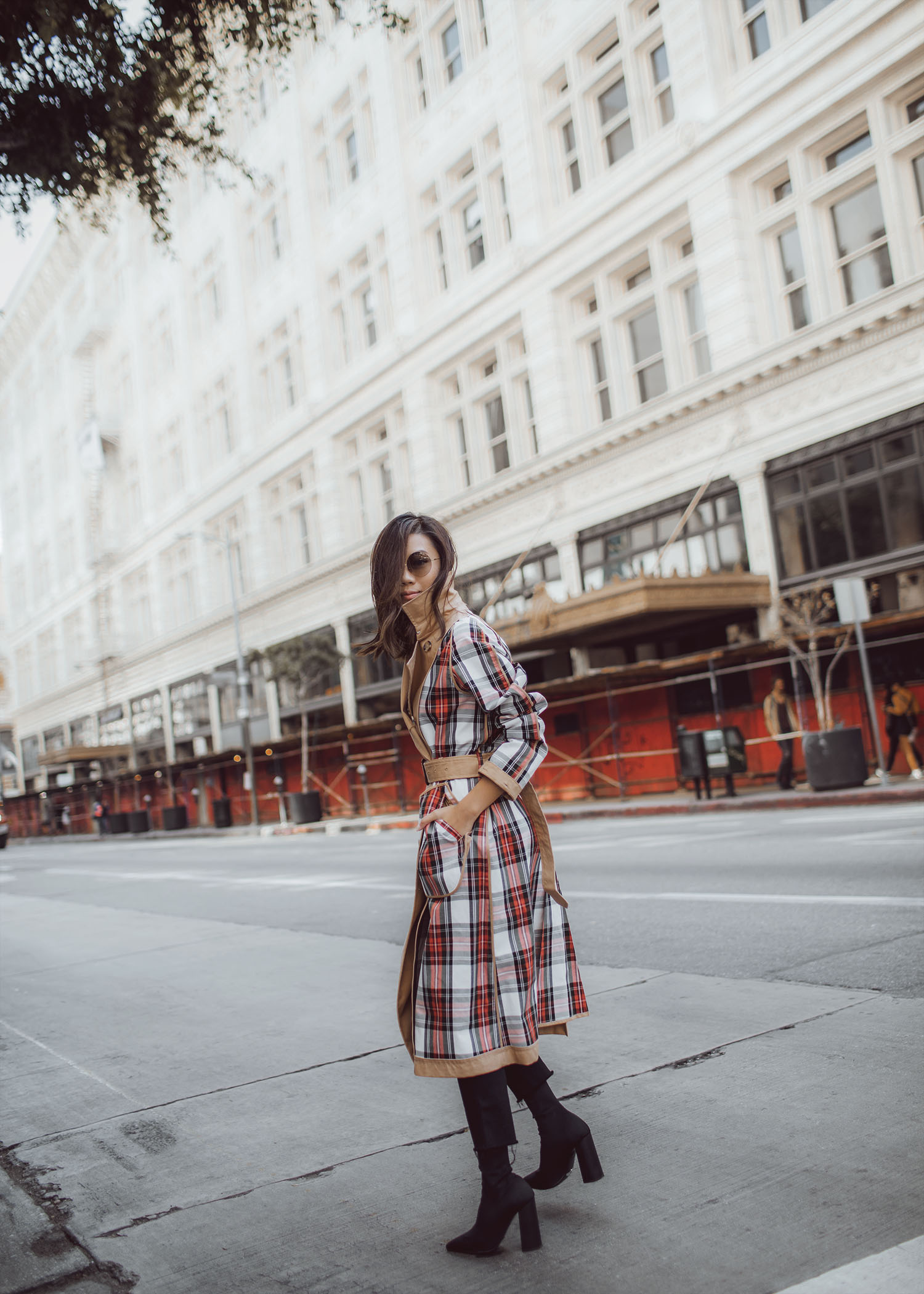 Jenny Tsang of Tsangtastic wearing uniqlo jw anderson trench coat and victoria beckham rounded sunglasses