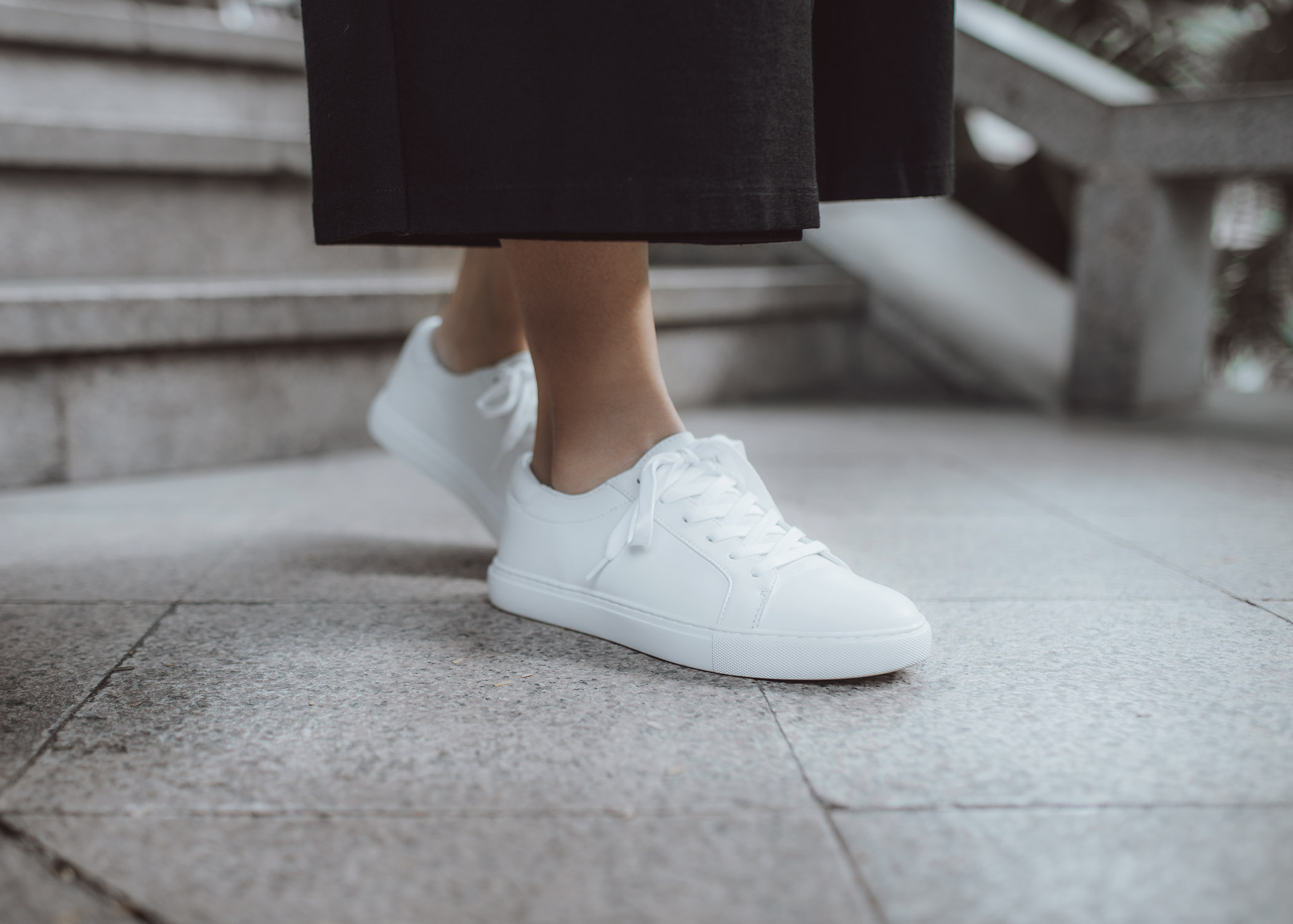 Jenny Tsang of Tsangtastic wearing sequins camisole military blazer asymmetrical culottes and white sneakers 