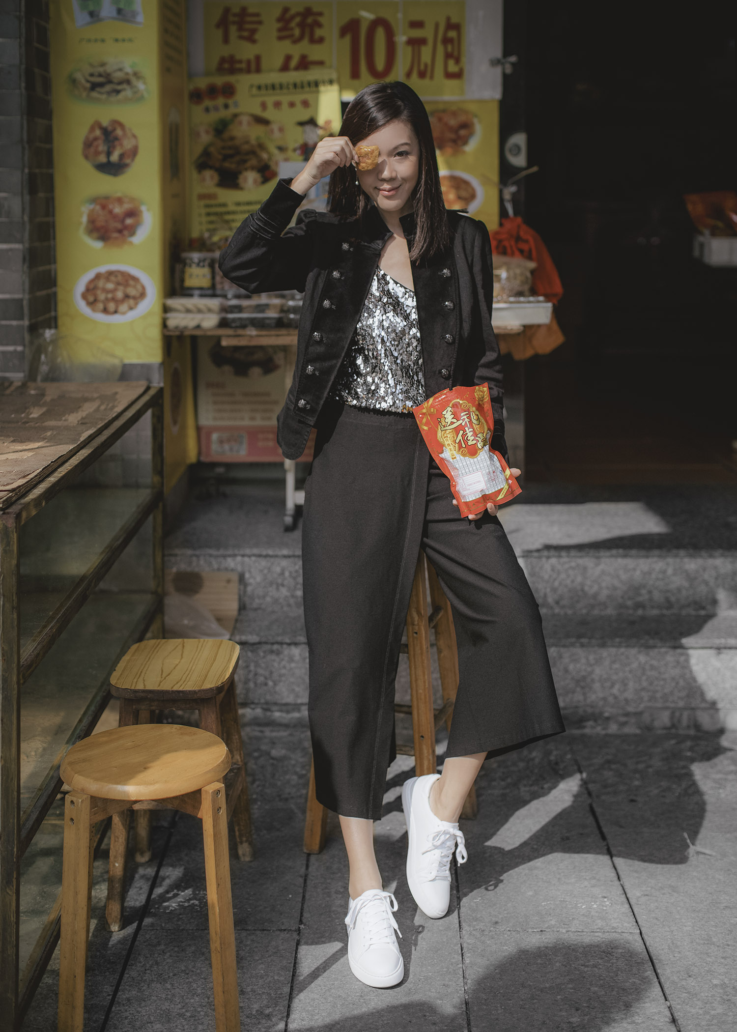 Jenny Tsang of Tsangtastic wearing sequins camisole military blazer asymmetrical culottes and white sneakers 