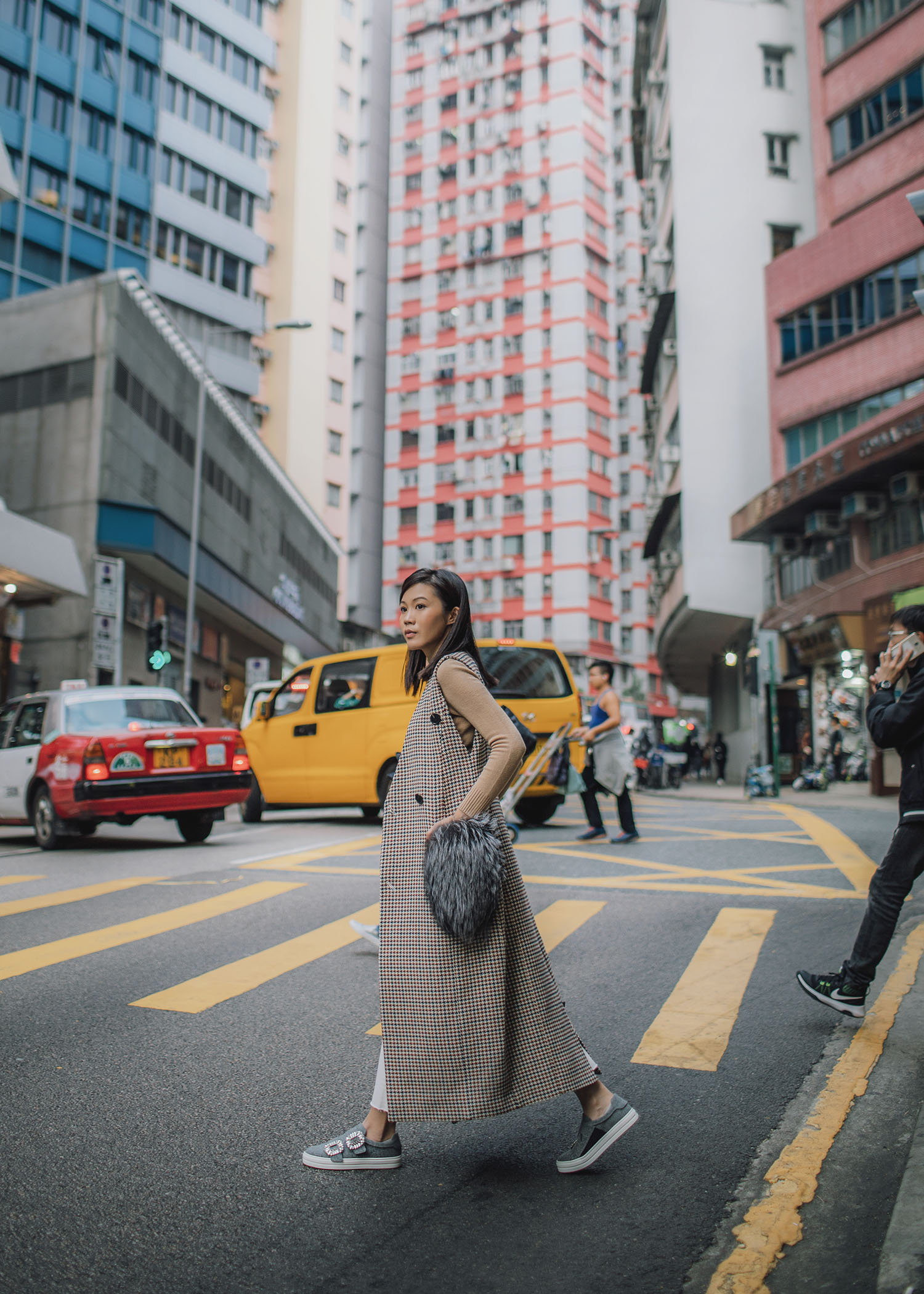 Jenny Tsang of Tsangtastic styling long coat vest in Hong Kong