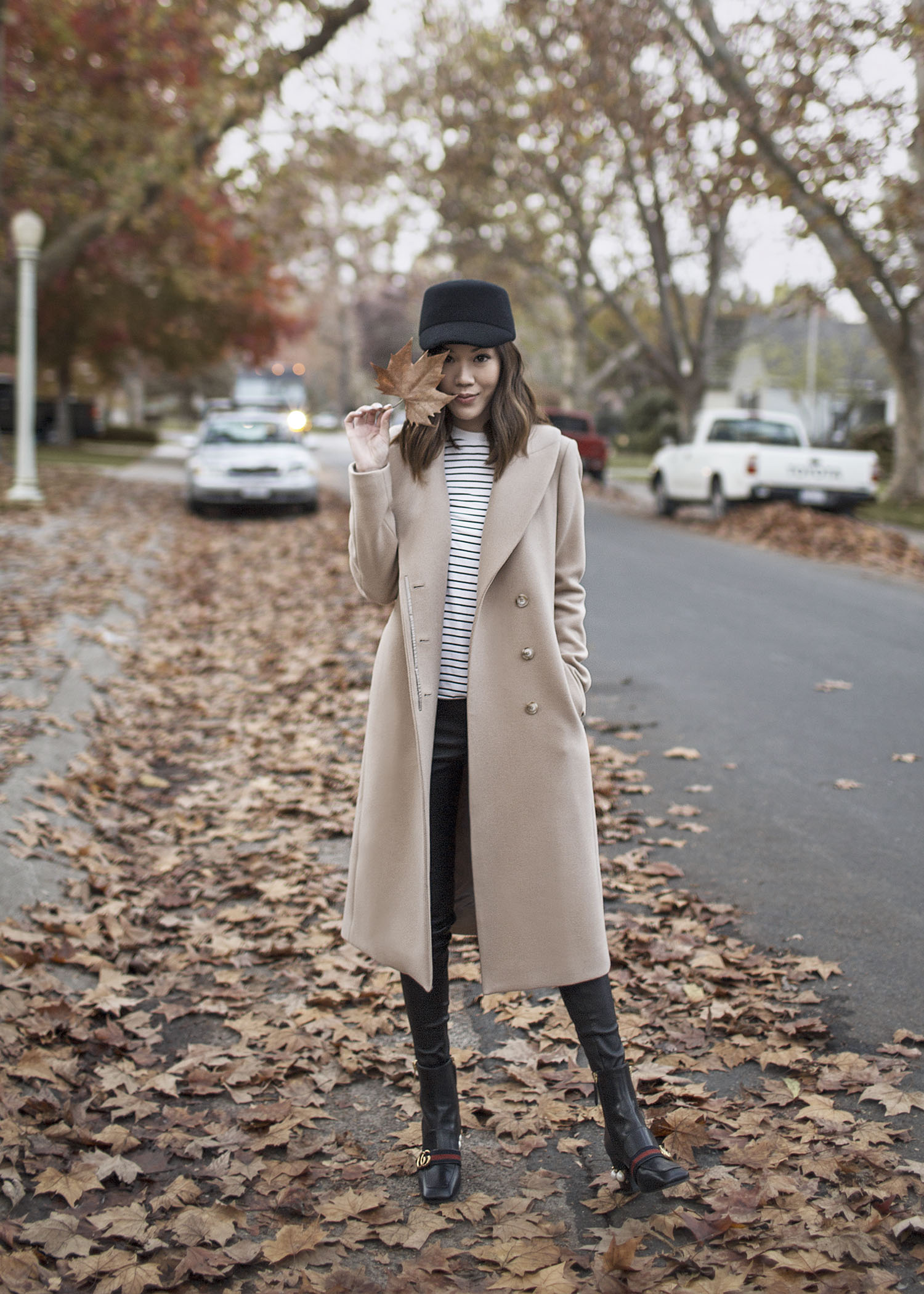 Jenny Tsang of Tsangtastic styling different ways to wear long coats
