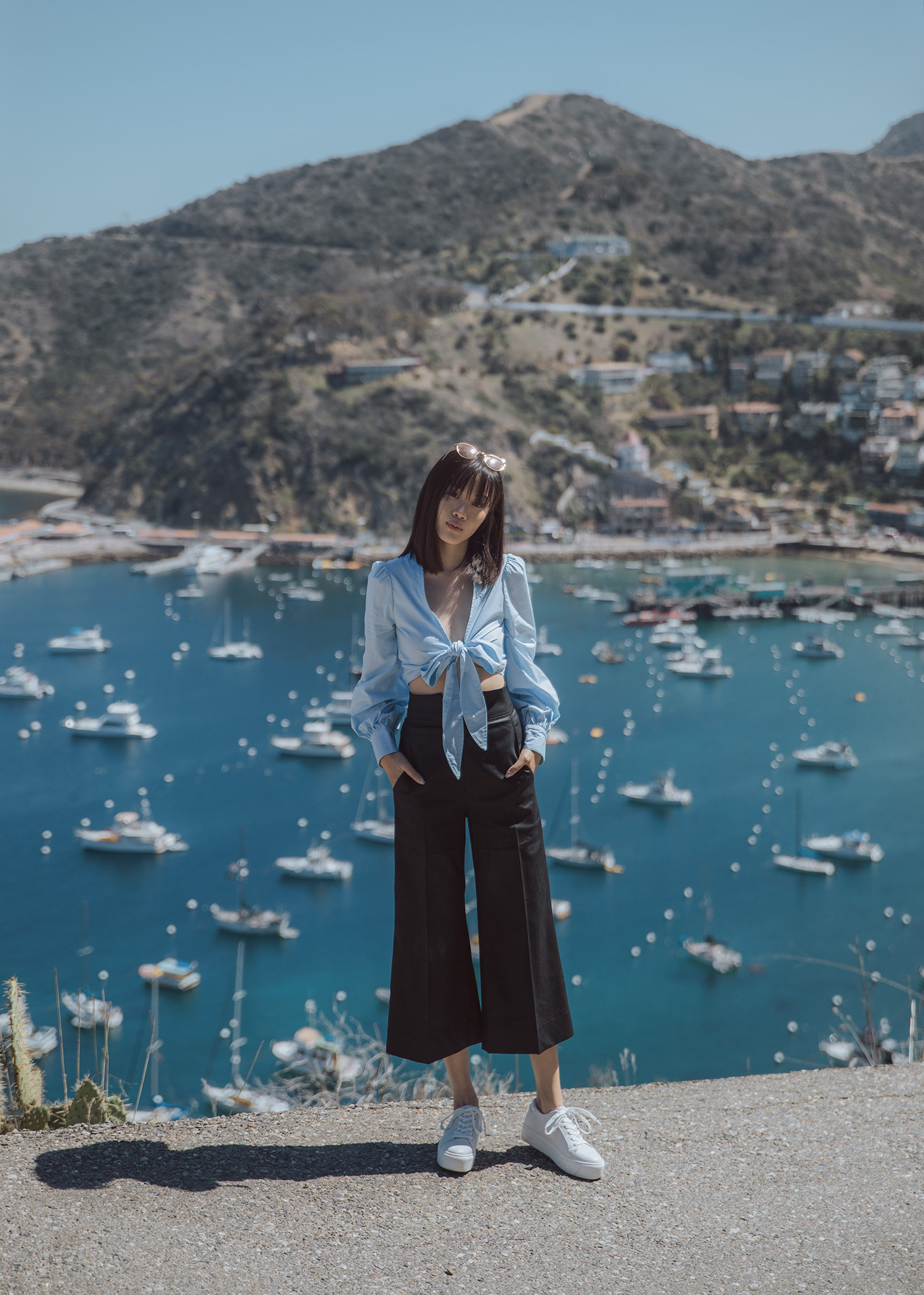 Cropped shirt top culotte flared pants white platform sneakers in Catalina Island