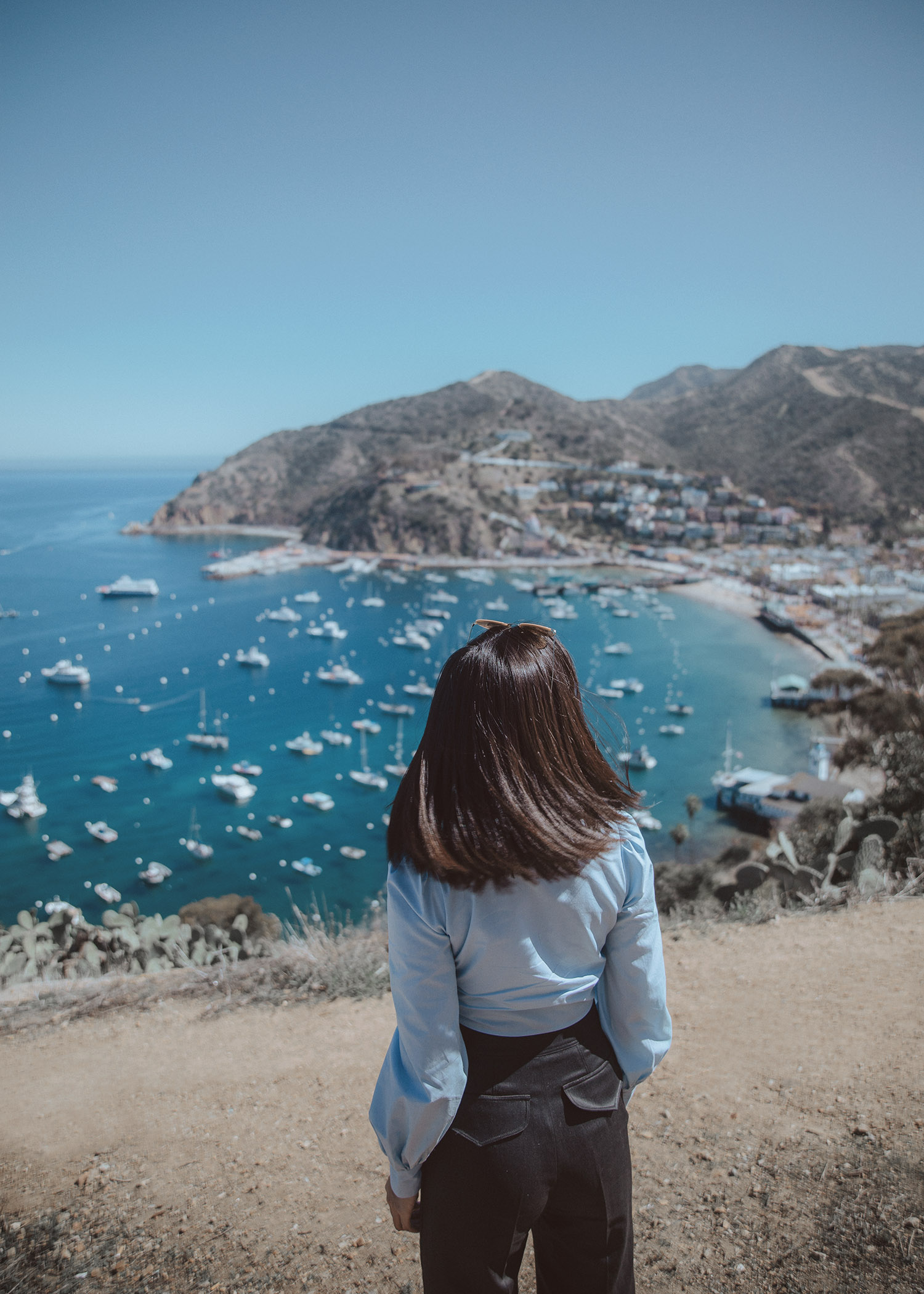 Cropped shirt top culotte flared pants white platform sneakers in Catalina Island