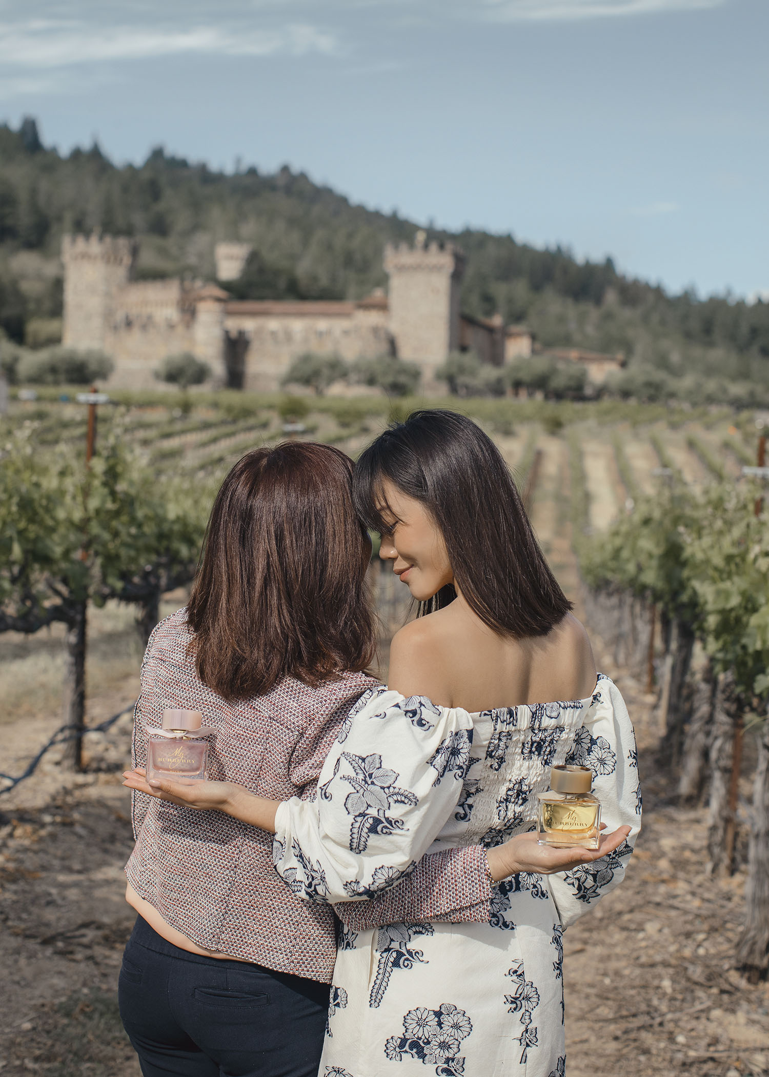 Jenny Tsang of Tsangtastic in Napa Valley castle with Burberry My Burberry Classic My Burberry Blush fragrance wearing Sea NYC dress