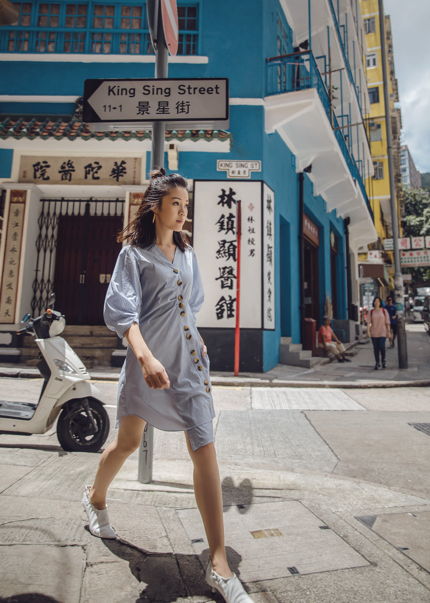 Tibi asymmetrical shirtdress with high-front white pumps in Hong Kong