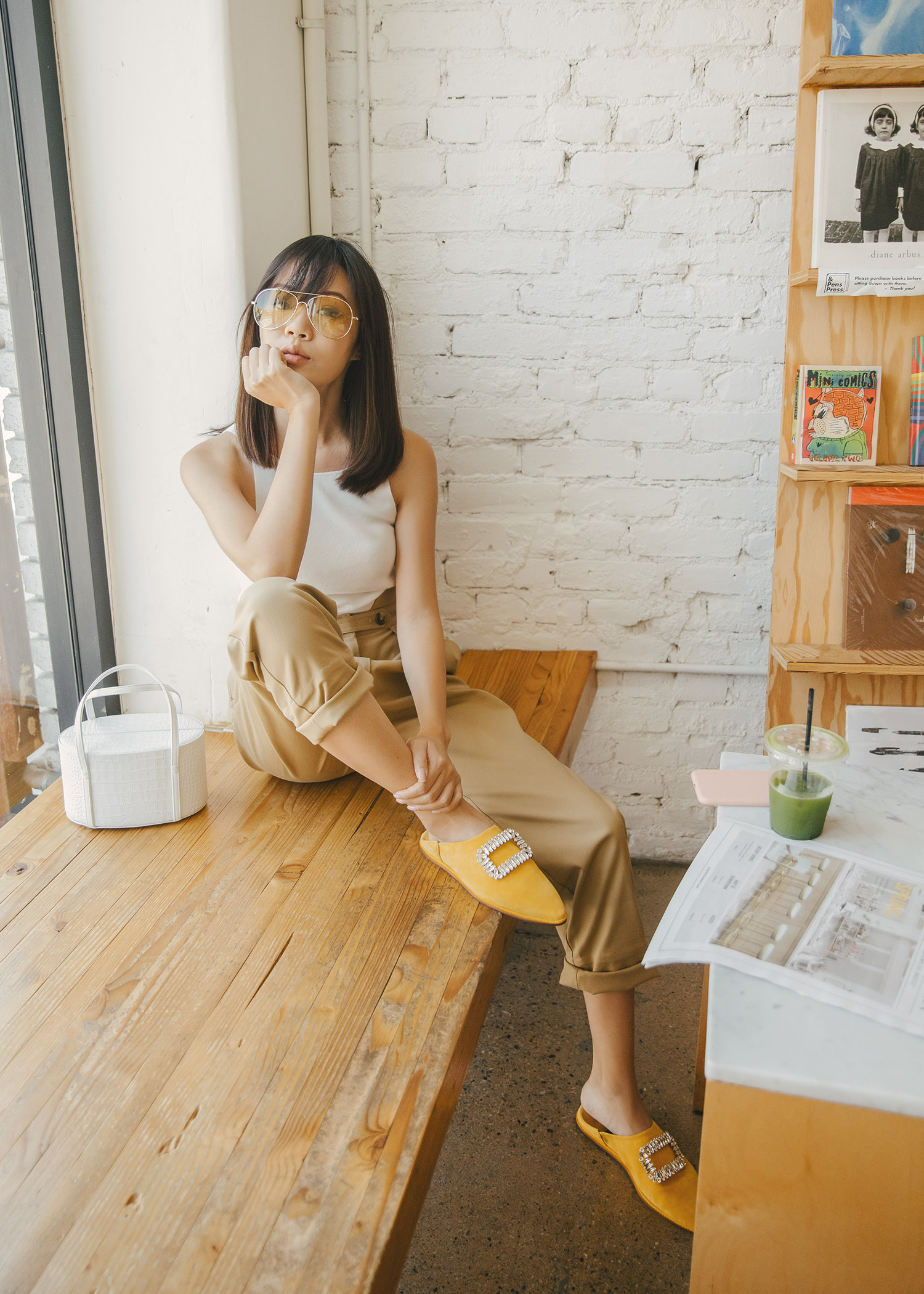 roger vivier bab viv mules in yellow suede with tank top with high-waisted pant