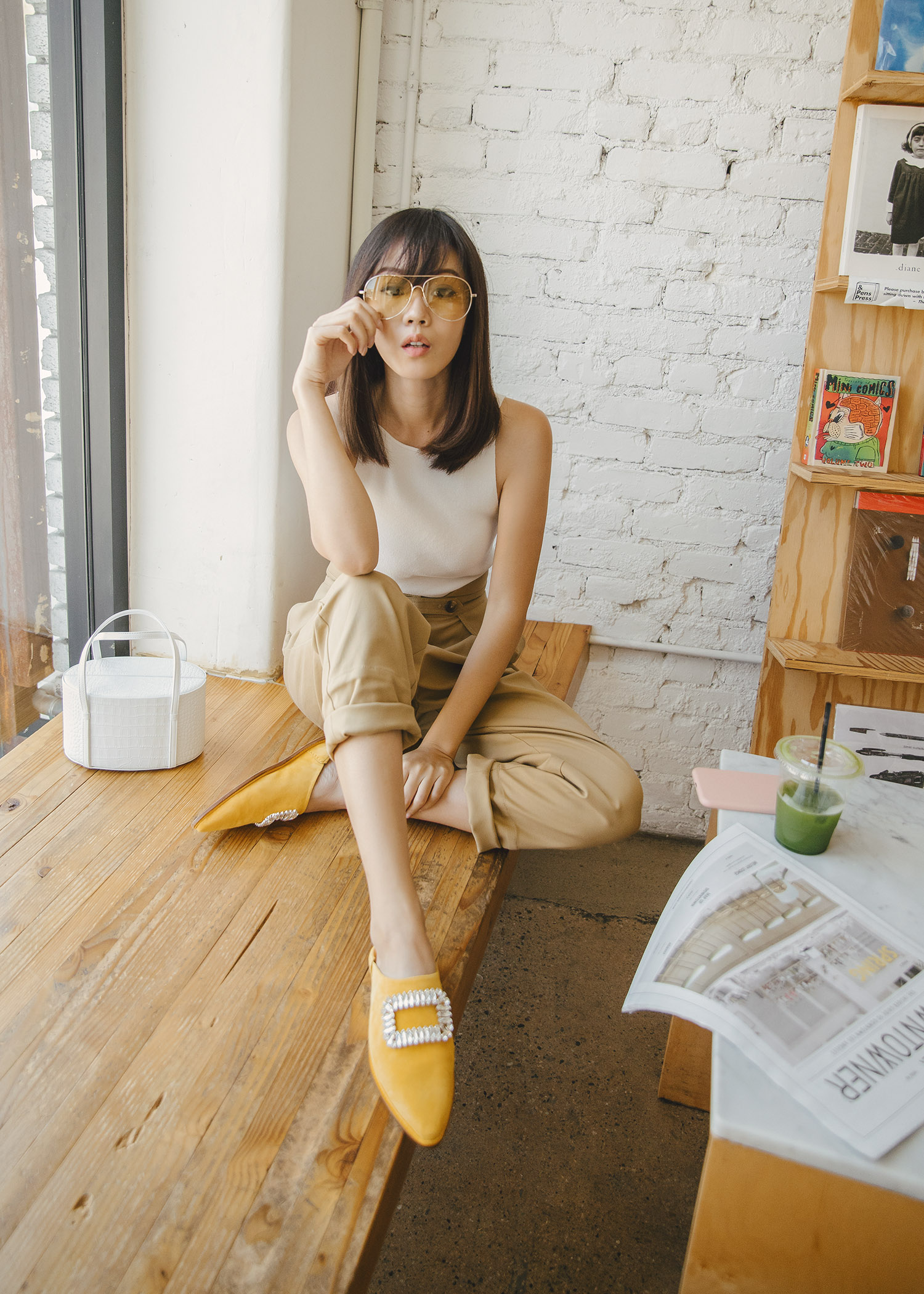 roger vivier bab viv mules in yellow suede with tank top with high-waisted pant