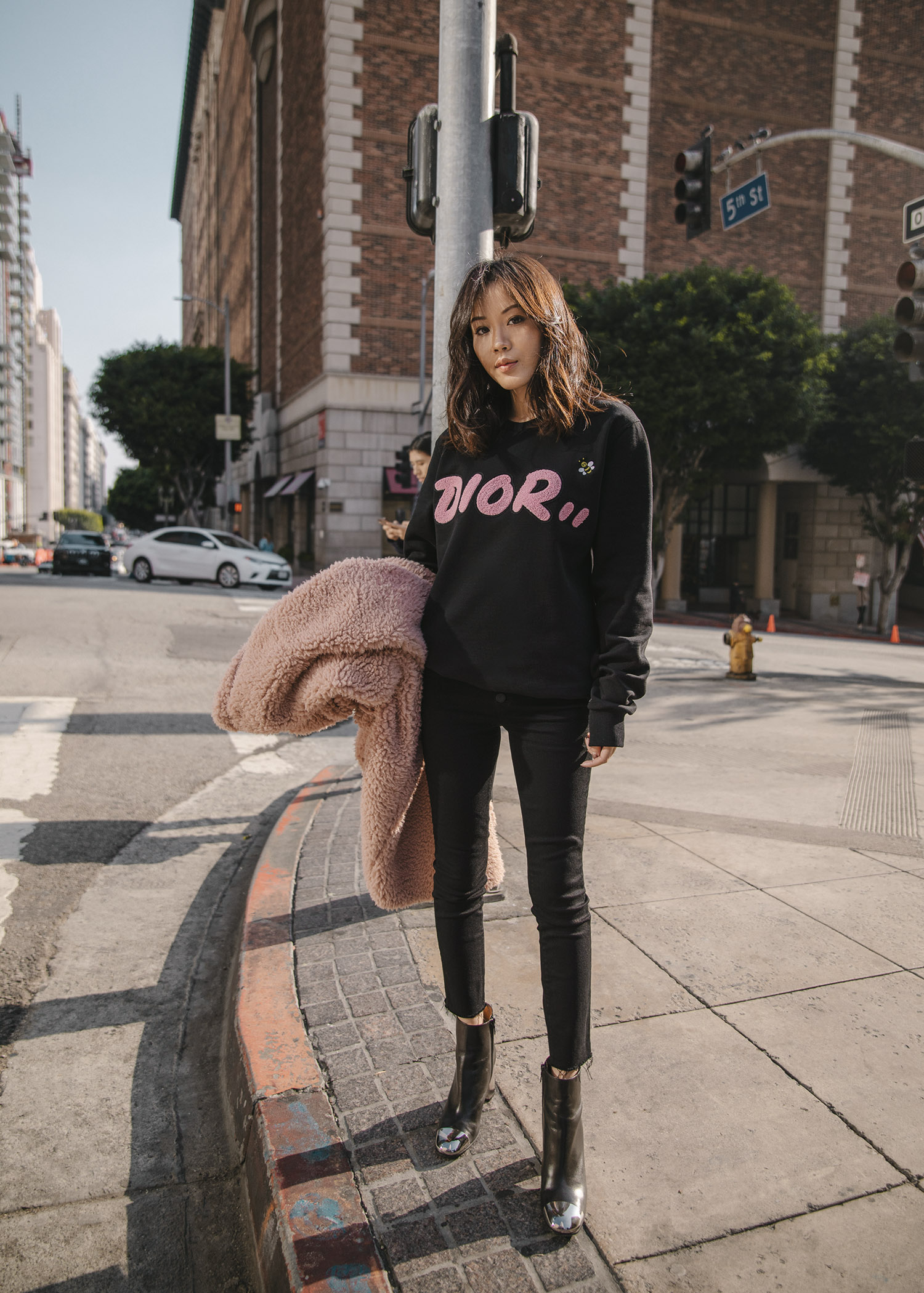 Jenny Tsang of Tsangtastic styling Dior x Kaws cotton sweatshirt Dior Summer 19 capsule collection in collaboration with KAWS by Kim Jones
