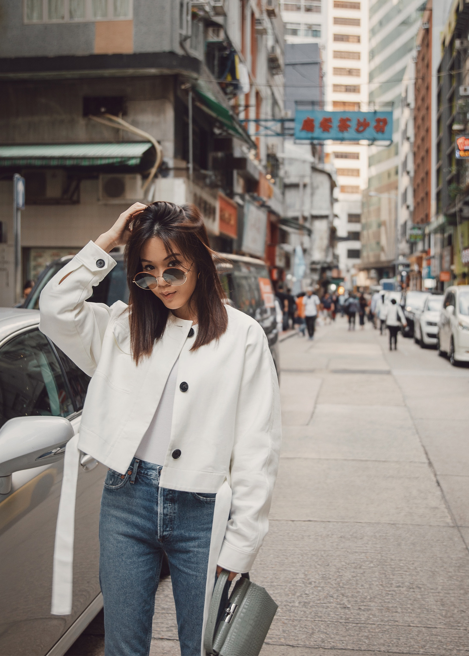 jenny tsang wearing cropped jacket and agolde jeans from net-a-porter in hong kong